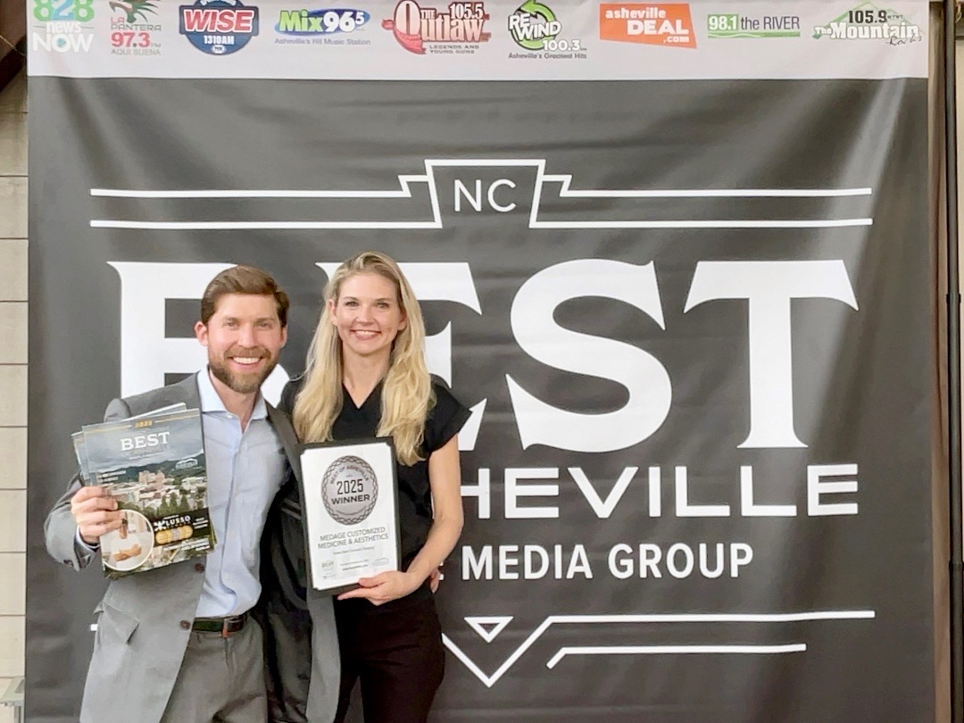 Dr. Sarah Long and Eric Rodriguez with the Best of Asheville Silver Award 2024